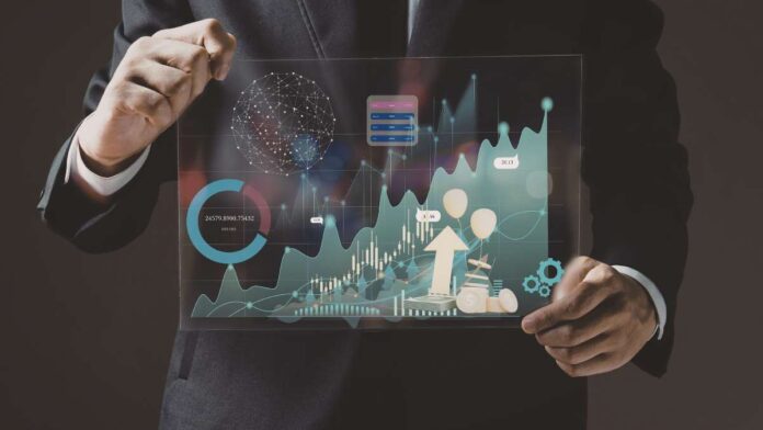 Businessman holding digital financial data